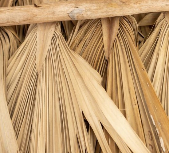 Sustainable palm thatched roofing used in Genn Eco Hotel’s beachfront eco-cabins.